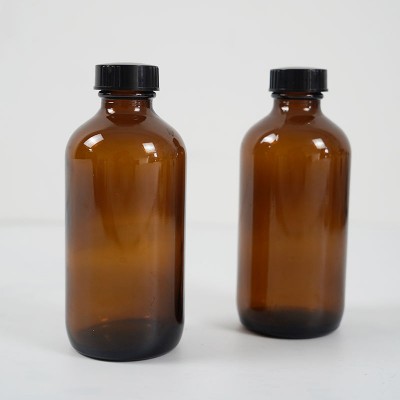 L'utilité polyvalente des flacons ronds Boston de 2 oz dans les emballages cosmétiques modernes - Flacon rond Boston de 2 oz (images 1)